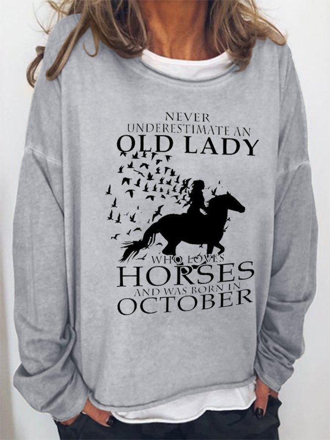 Never Underestimate An Old Lady Who Loves Horses And Was Born In October Graphic Sweatshirt